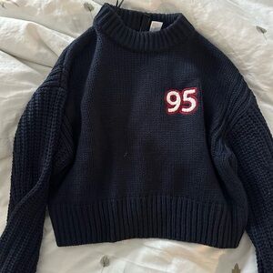 Navy Blue Sweater with Red Accent
